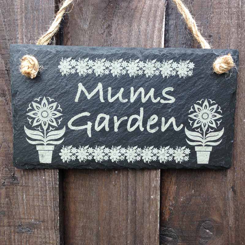 slate garden signs with flower pot